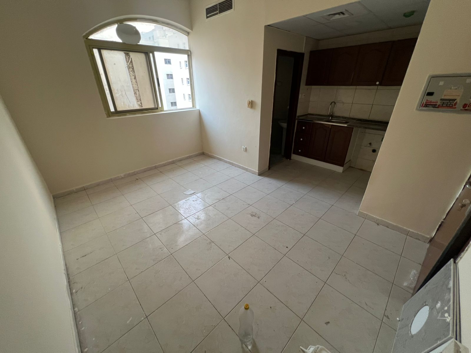 Studio apartment for rent - separate kitchen - at a very special price - prime location near Ajman Court and University