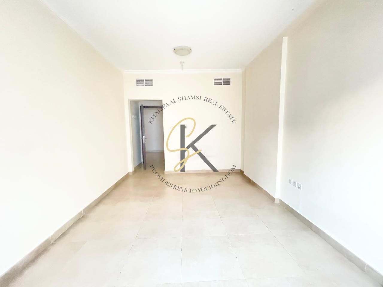 Spacious Unfurnished 2 BHK Apartment with Balcony & Dedicated Parking for Rent in Muwailah Commercial, Sharjah | 1350 Sqft | All Amenities | Prime Location