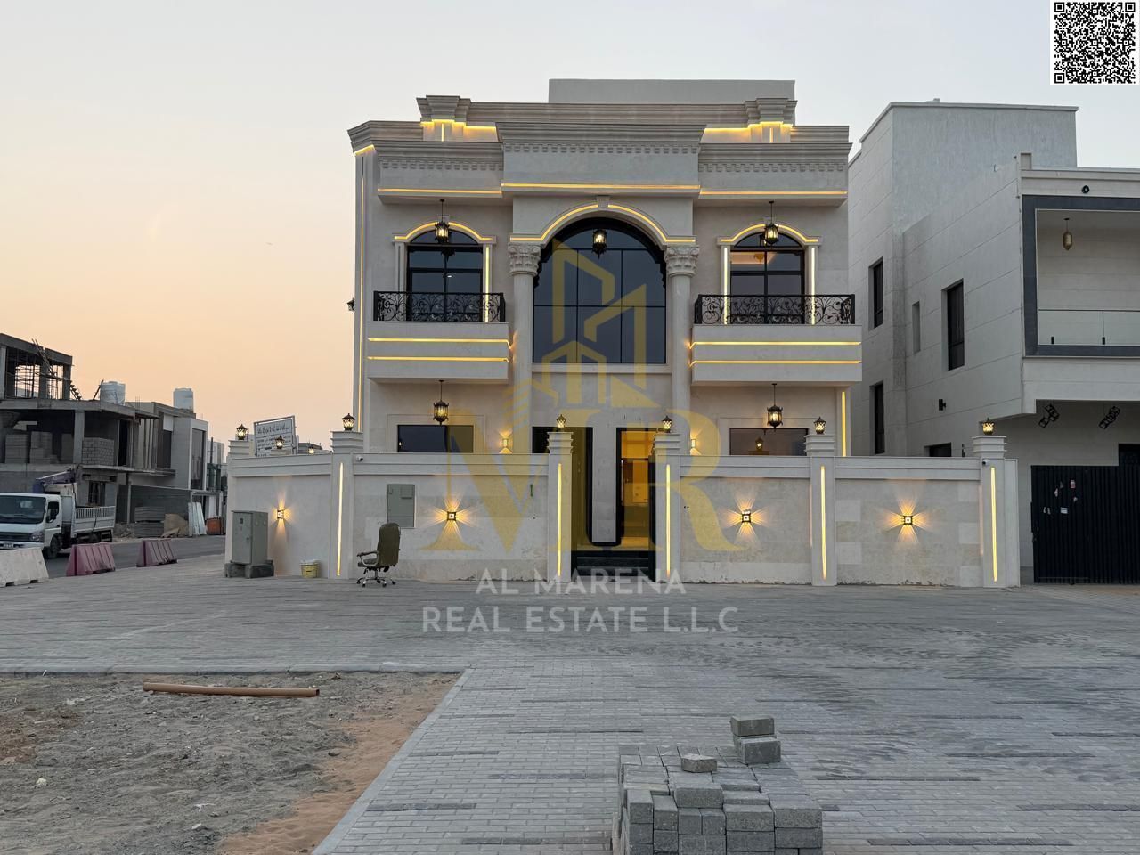For sale in a corner unit in Al Helio 2, Ajman - 5 master bedrooms, living room, majlis, and maid's room - freehold ownership for all nationalities -