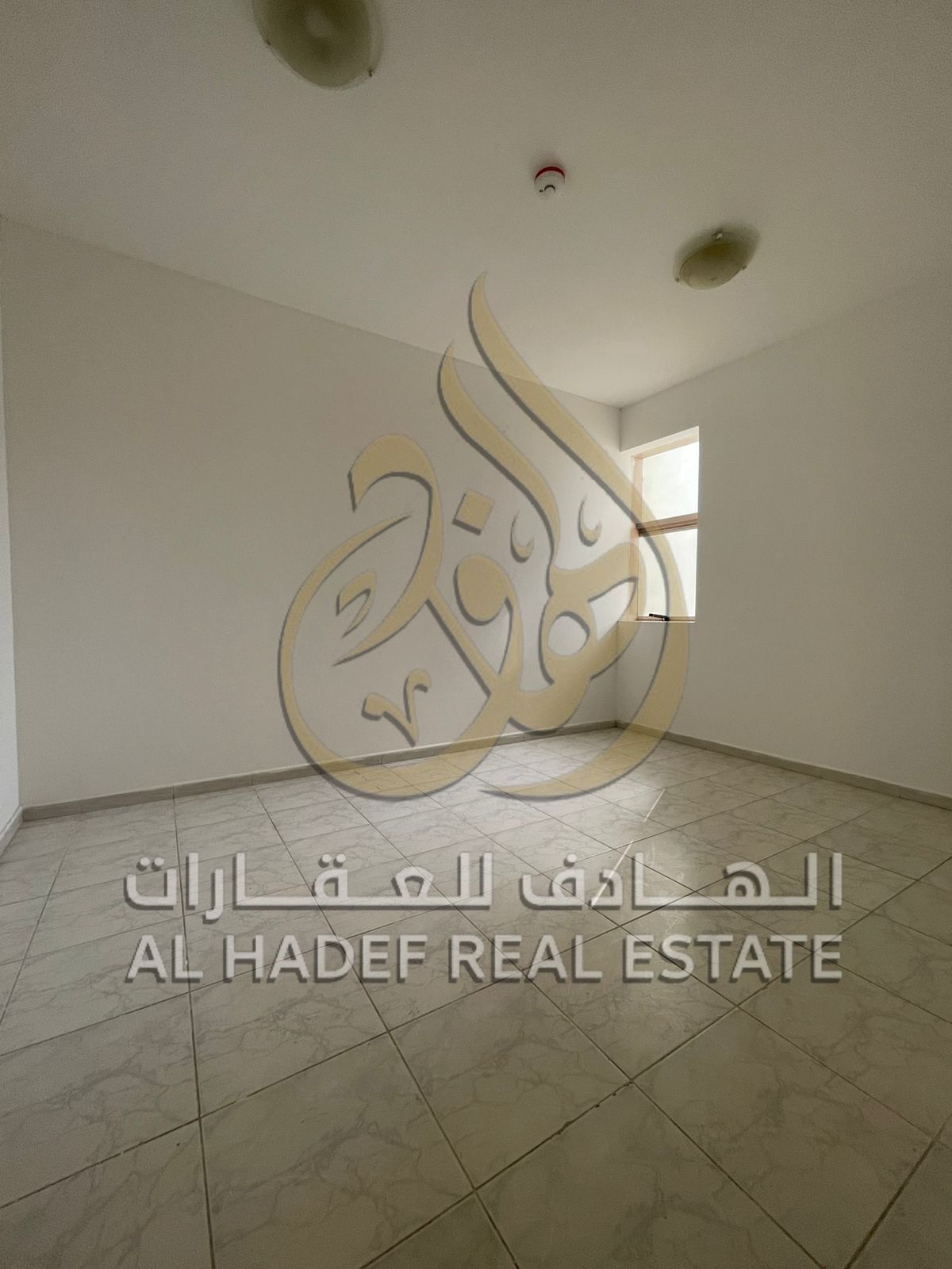 A room and a hall available for annual rent in the Al-Qasimia area. Payments can be made in 4 or 6 installments, and the security deposit is in cash.