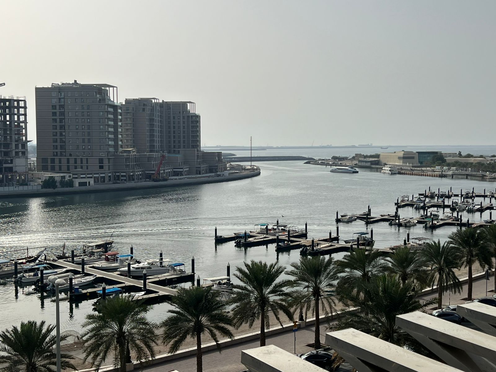 Sea view with balcony and maid’s room, in a vibrant prime location close to cafés, shops, all services, and near the Dubai exit.