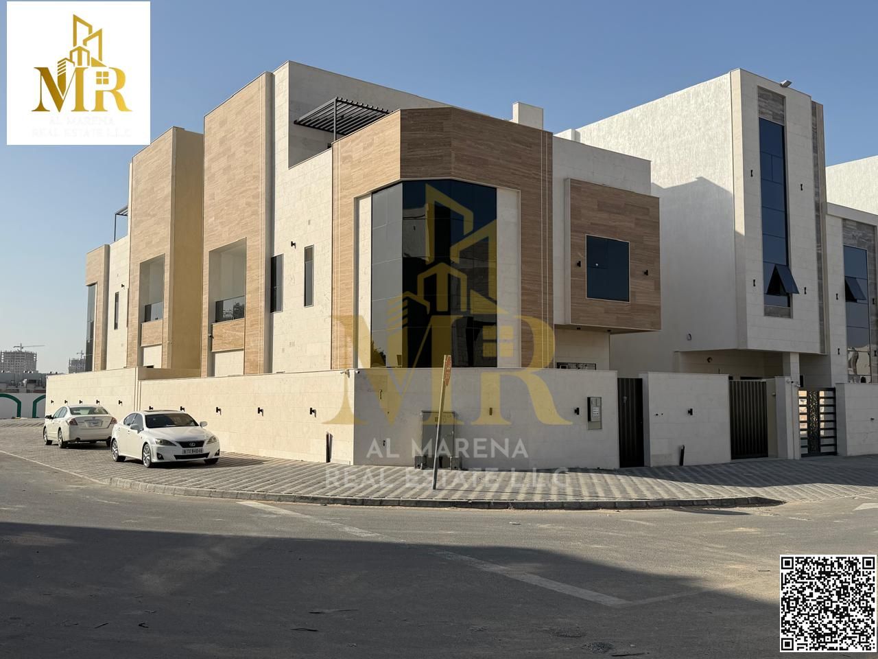 Spacious villa for sale in Al Helio 2, Ajman, with premium finishes and price including registration fees.