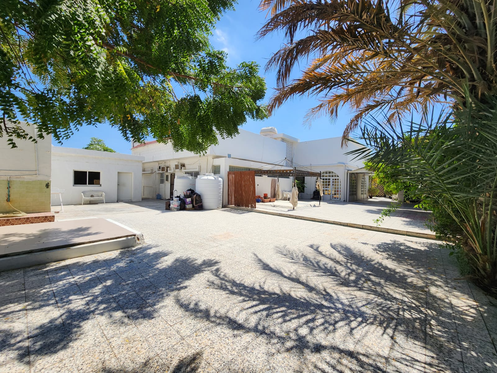 Villa for sale in Sharjah/Al Qadisiyah, second plot from the main road.