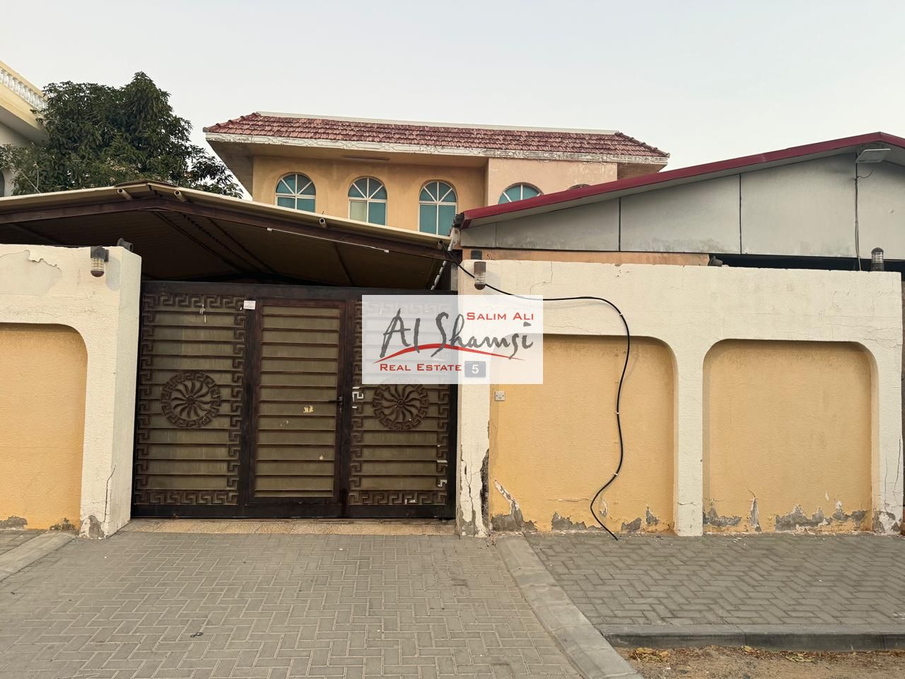 Villa for sale in Al Nakheelat, prime location near the main road
