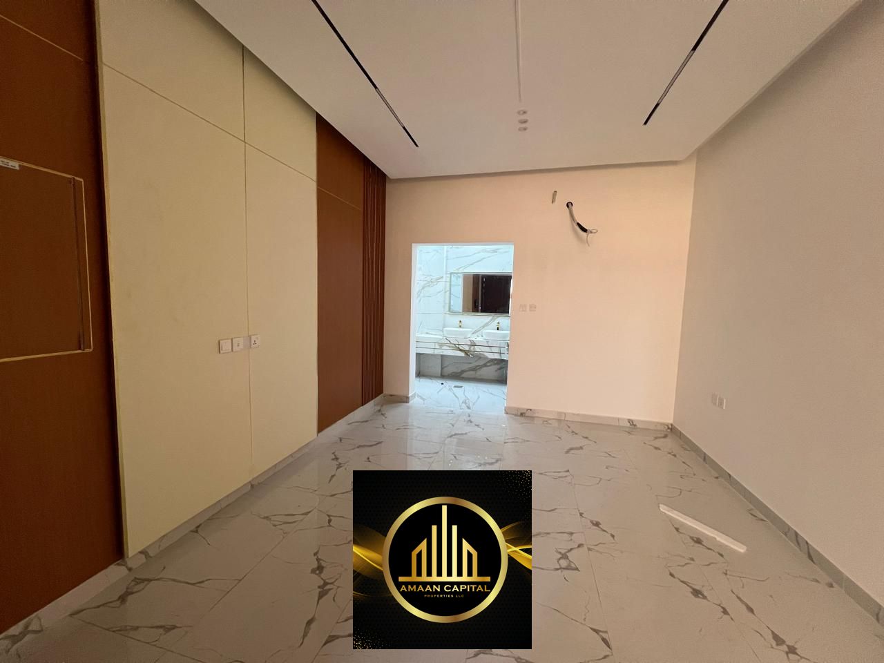 Townhouse for sale in Al Helio 2, Ajman, first occupancy, including registration fees, electricity and water.