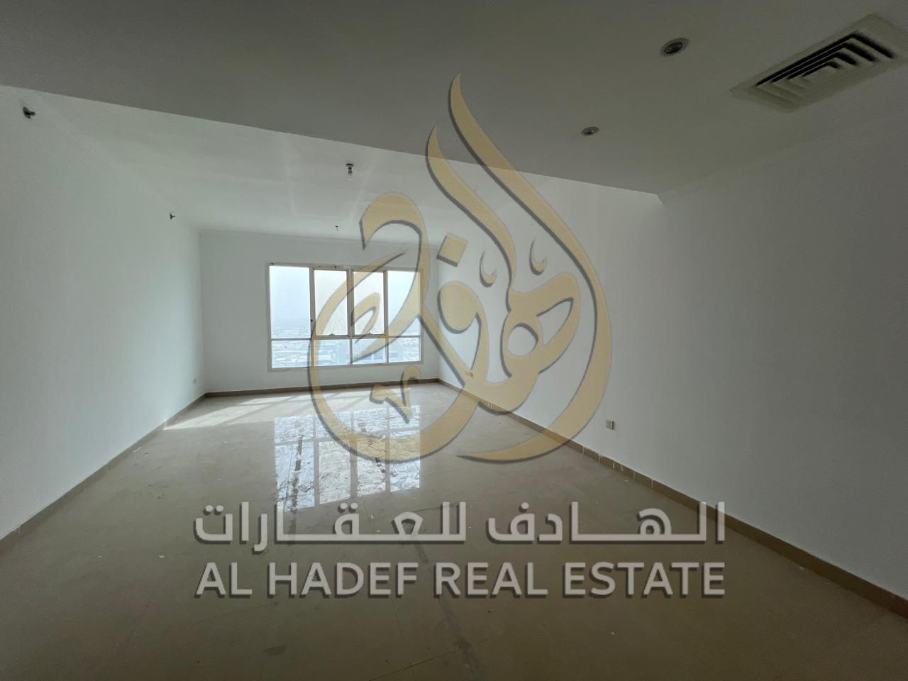 For rent in Sharjah - Al Majaz 2, a three-bedroom apartment with a living room in a strategic location, with a swimming pool and free parking.