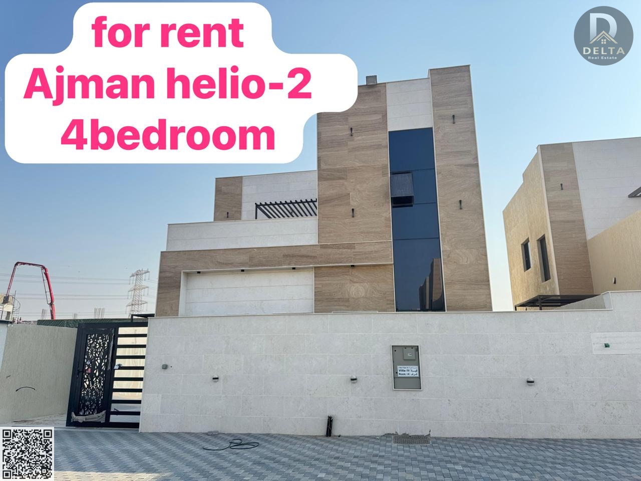 A modern villa is available for rent in the Al Helio area of Ajman. The villa features a modern design and a large setback in front of the villa. It
