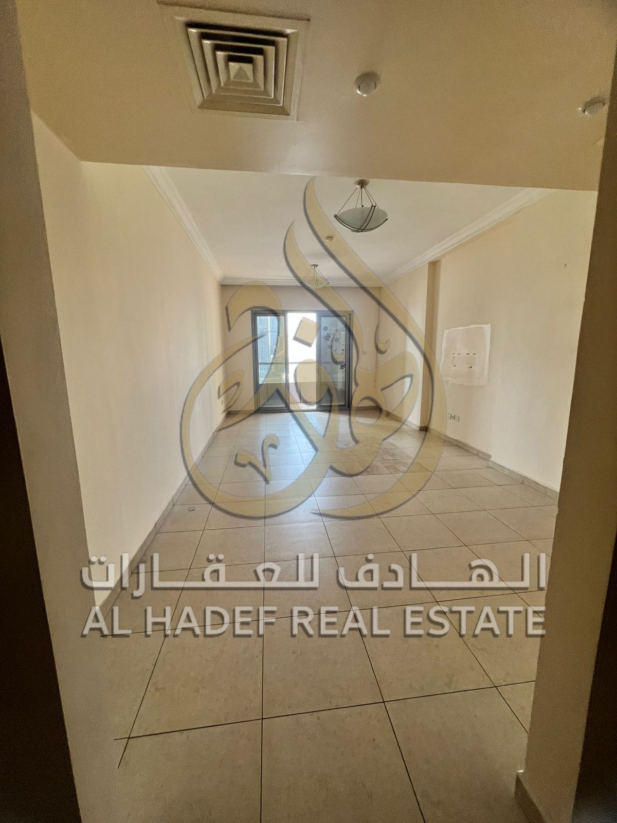 A 3-bedroom apartment with a living room, 3 bathrooms, and a balcony overlooking Al Khan Lake, suitable for families looking for comfortable and fully