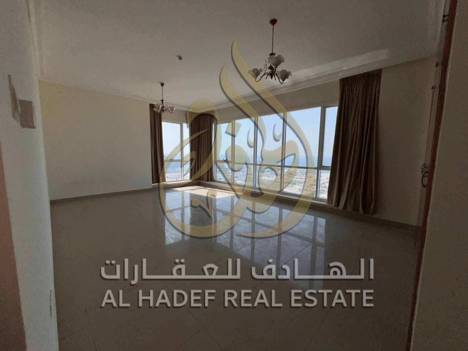 A 3-bedroom apartment with a living room, maid's room, and hallway with an open and distinctive view, suitable for families looking for luxurious and