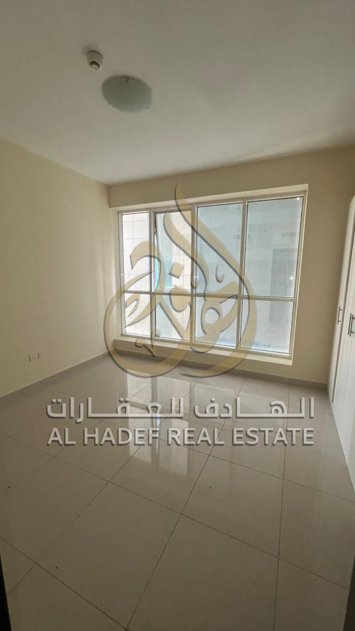 Two-bedroom apartment with a living room, no balcony, in a strategic location in Al Majaz 2, suitable for families looking for comfortable and fully s