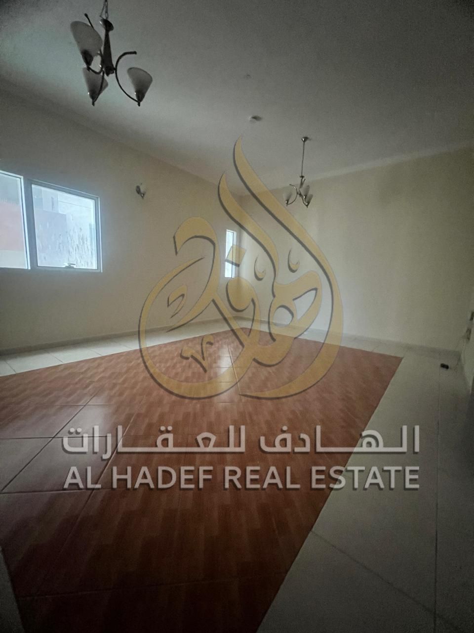 For rent in Sharjah - Al Qasimia Al Nad: a two-bedroom apartment with a living room, free air conditioning, strategically located in the Al Qasimia Al