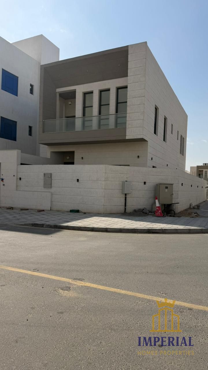 Villa for sale in Al Yasmin area, Ajman, privately built with high-quality finishing, corner plot on two streets