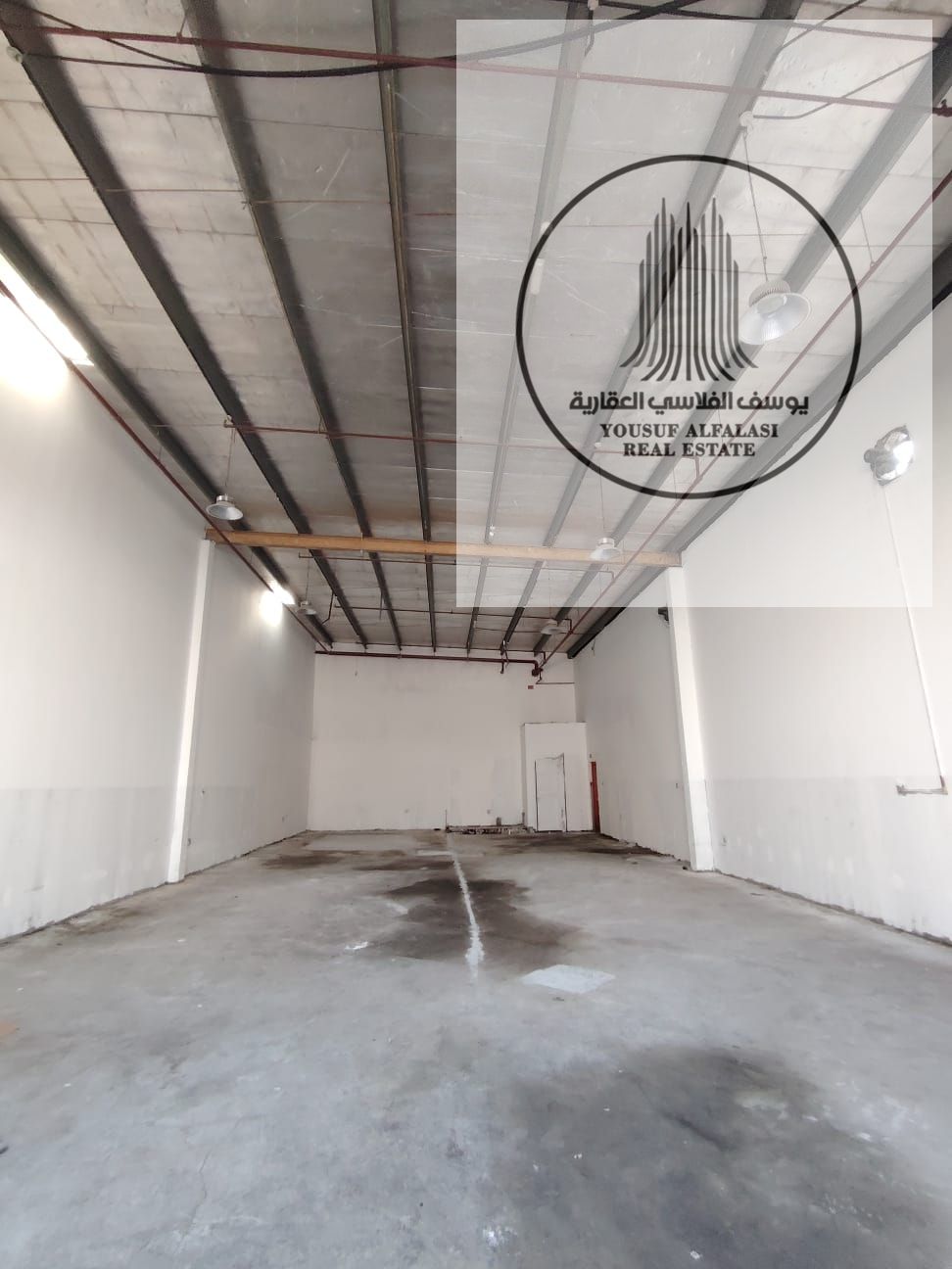 Warehouse for annual rent in Ajman Industrial Area 2 | Excellent height and practical space at a reasonable price. Area: 2700 sq ft