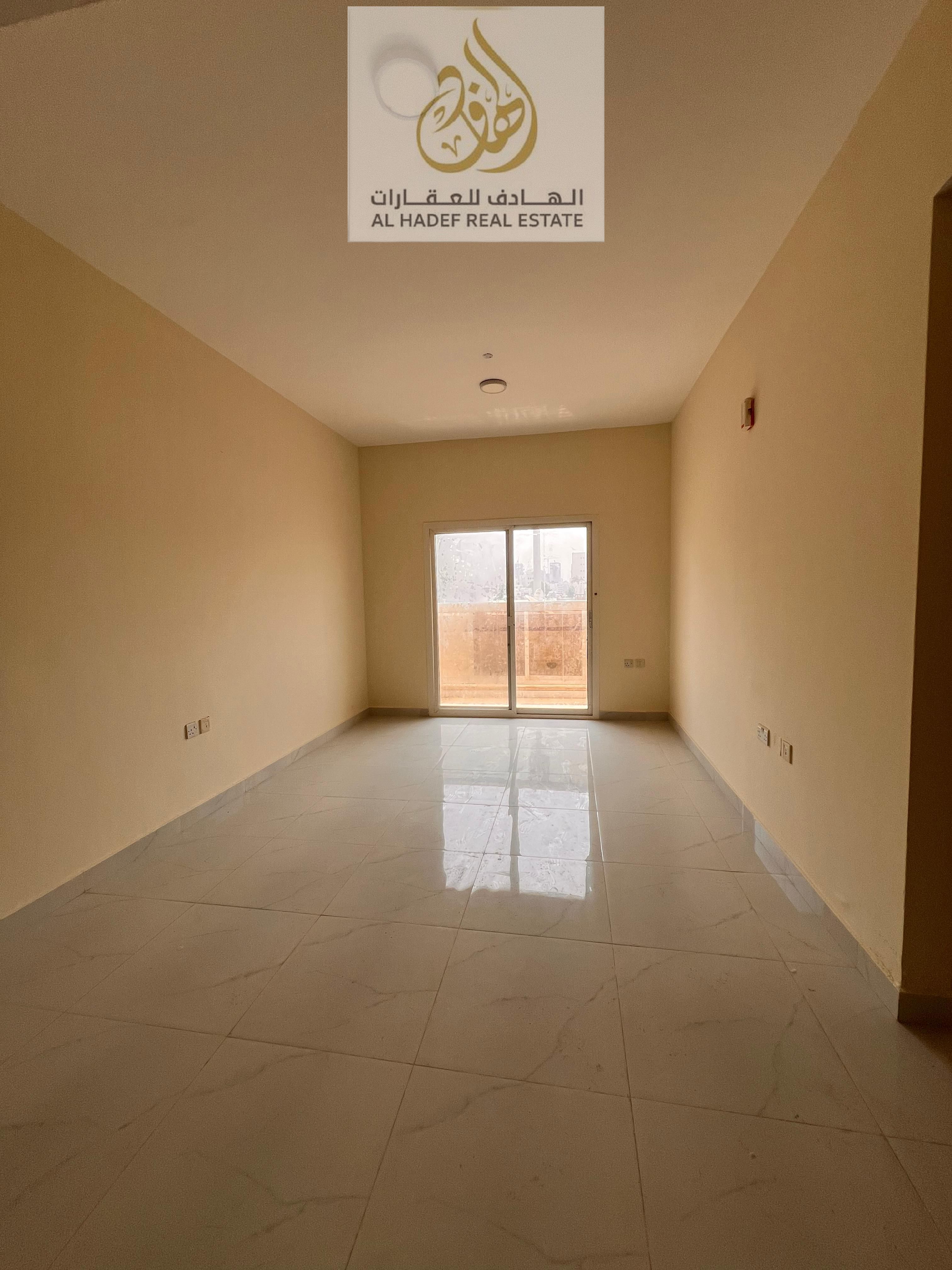 For annual rent : A one-bedroom apartment with a living room, bathroom , and balcony , equipped with central air conditioning for year-round