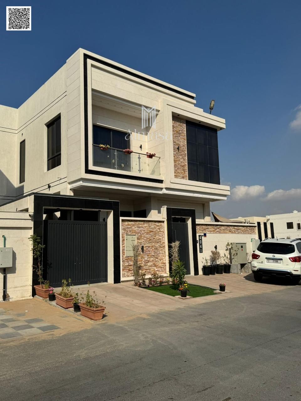 Villa for sale in Ajman at a bargain price, including electricity, water, and air conditioning