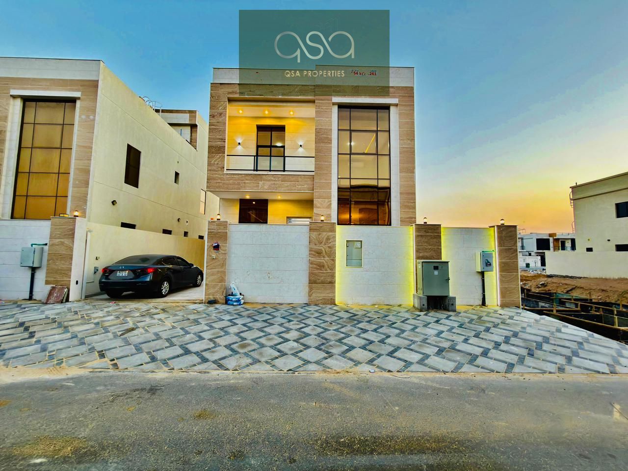 A luxurious villa in a prime location near Al Hamidiya Park and Al Zubair Street, with the price including electricity, water, and air conditioning.