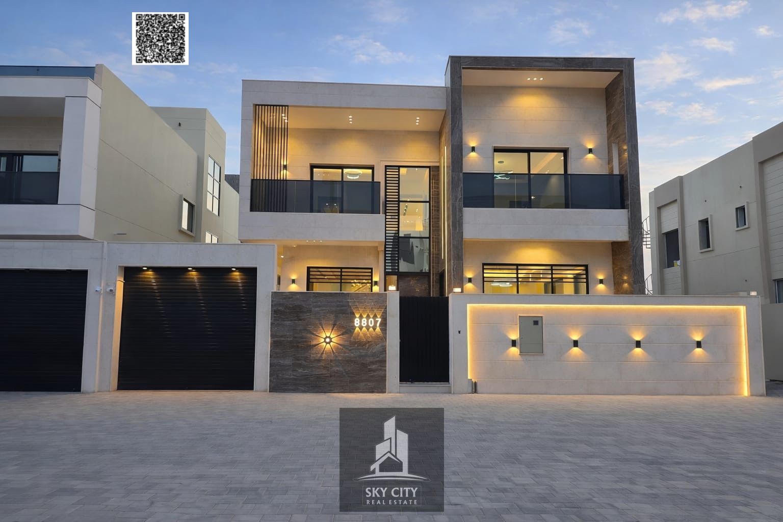 Villa for sale next to a mosque and behind Al Qabail Mall on a main street with a 30-meter front setback.