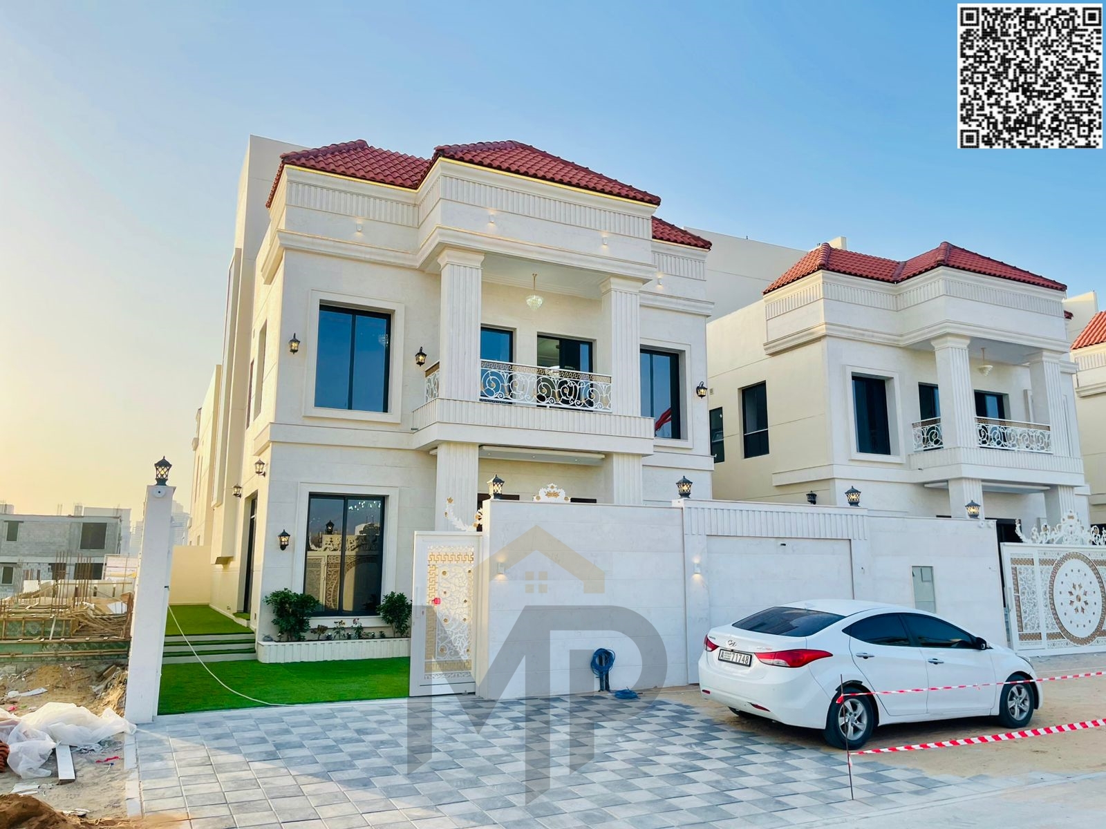 Luxury villa with high specifications and a large setback in Al-Haliyo 2, price includes registration fees and is negotiable.
