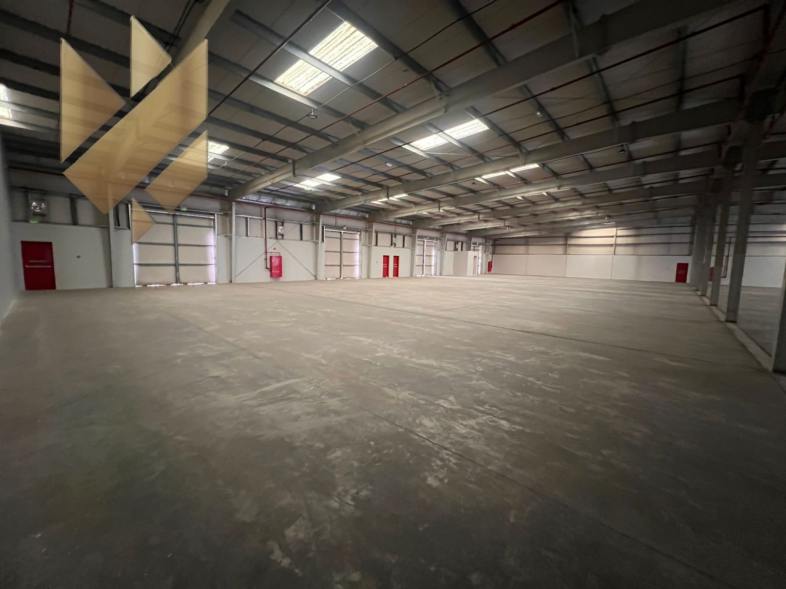 Large Warehouse in Al Sajaa with Power Supply