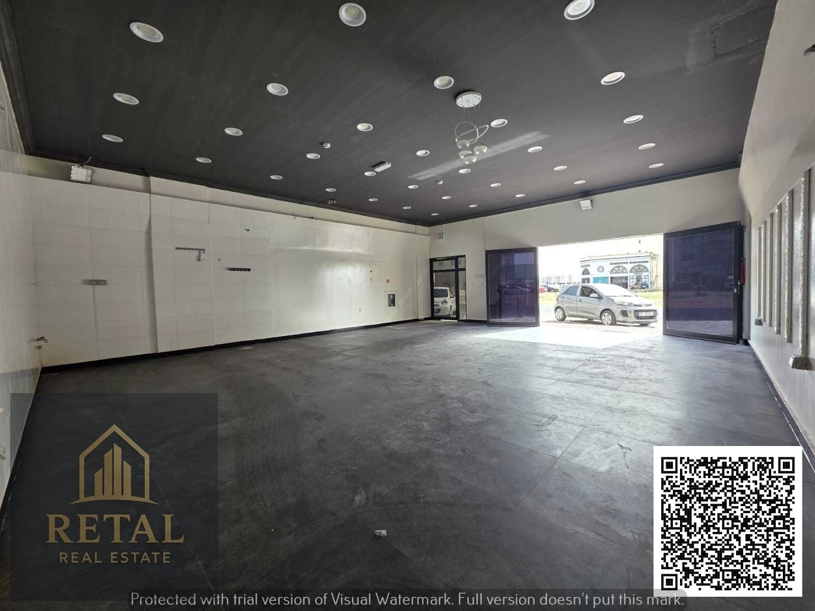 Commercial shop for rent in Al Alia Ajman, 45 sqm area, annual rent AED 50,000 in 4 payments with AED 10,000 cash deposit