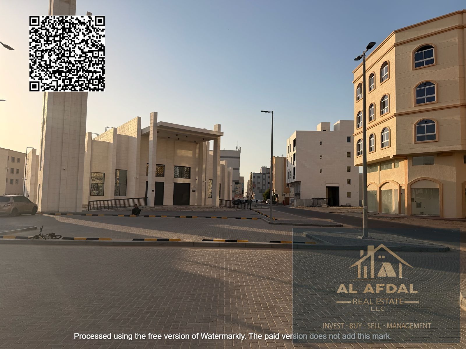 Own two plots of land in Al Alia, residential/commercial, corner lot, ready for construction.