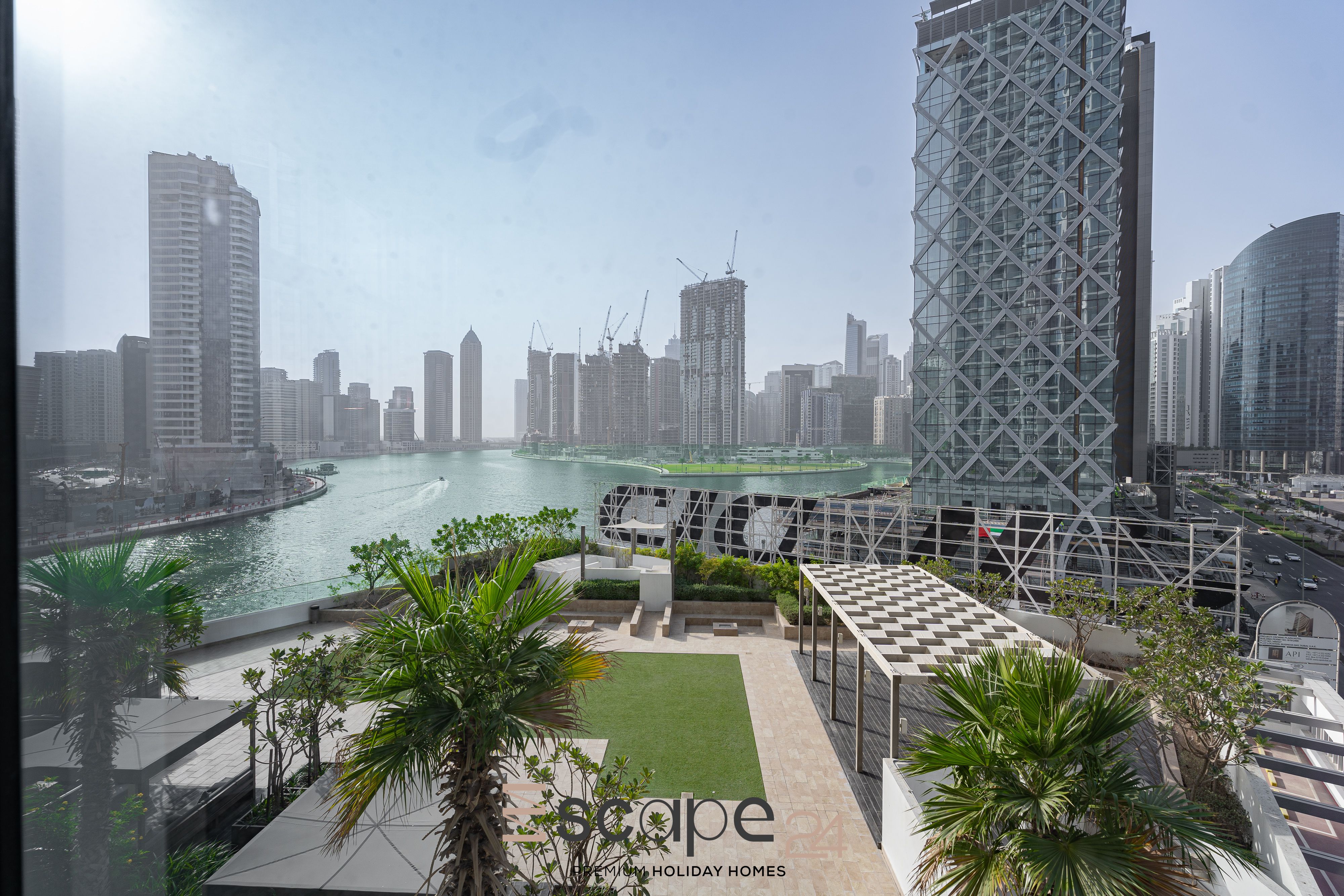 Near Burj Khalifa and Dubai Mall | Canal & Pool View | Utility Bills Included