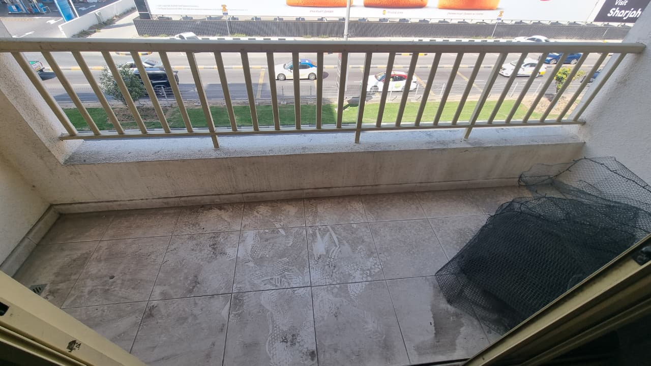The most beautiful and best-priced 3-bedroom apartment with a living room in Al Majaz 3, featuring a balcony with an open city view.