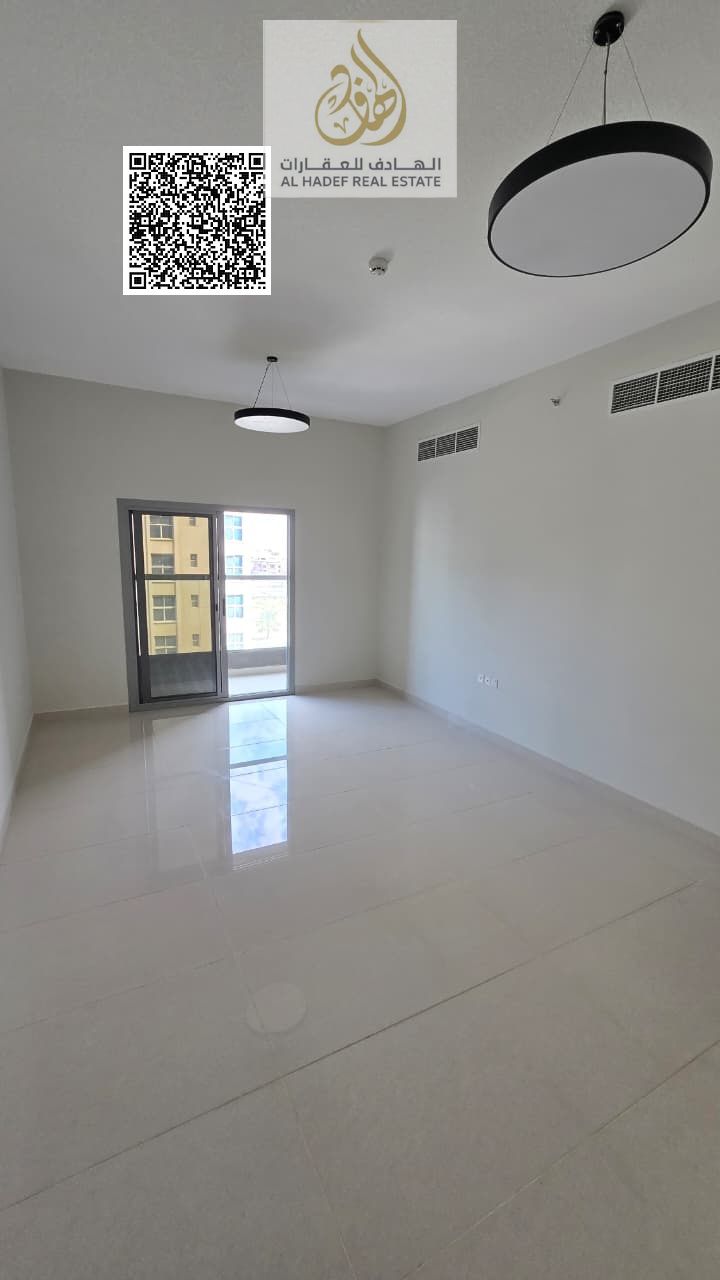 Two bedrooms and a living room with built-in wardrobes and a private parking space. Annual rent, second tenant.