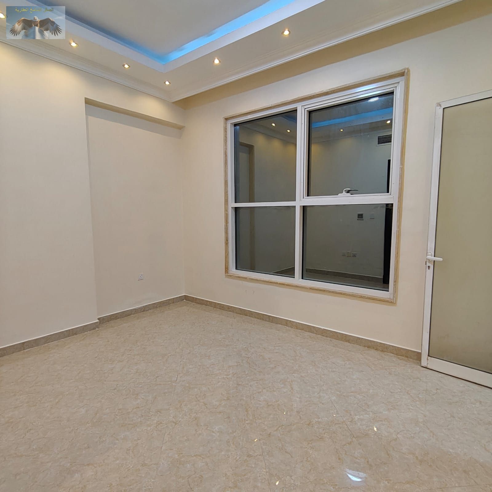 Two bedrooms and a living room with private parking, super deluxe finishing, flexible payment, close to all services, on the Dubai and Sharjah exit.