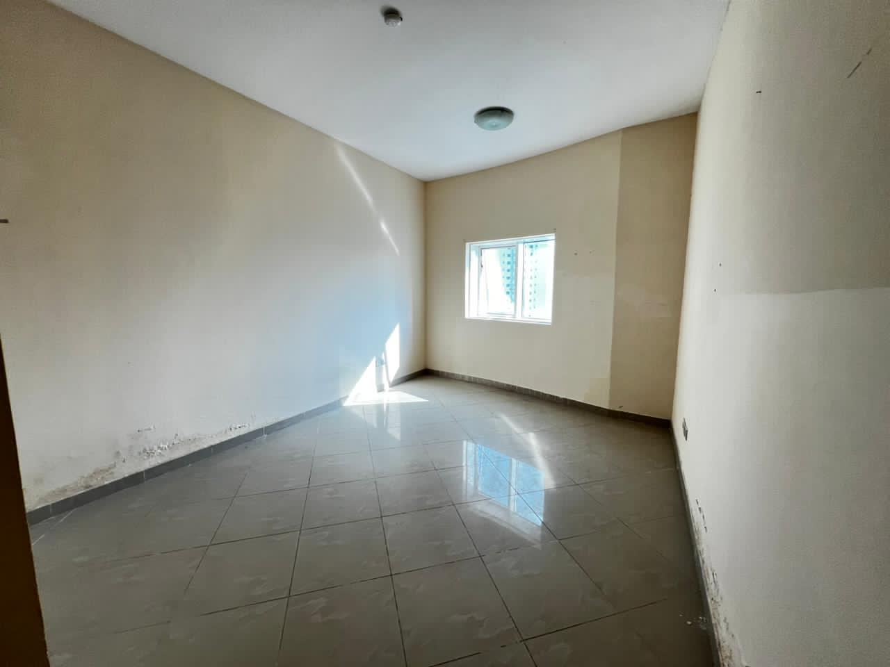 **1-bedroom apartment with hall in Al Majaz 1, 2 bathrooms, free AC, gym & pool**