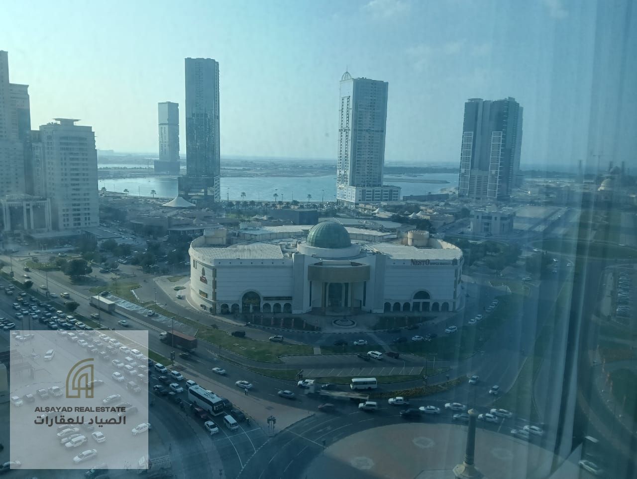 For sale: a two-bedroom apartment with a living room and maid’s room in Al Taawun, 1,816 sq. ft. , no parking, currently rented for AED 54,000 per year