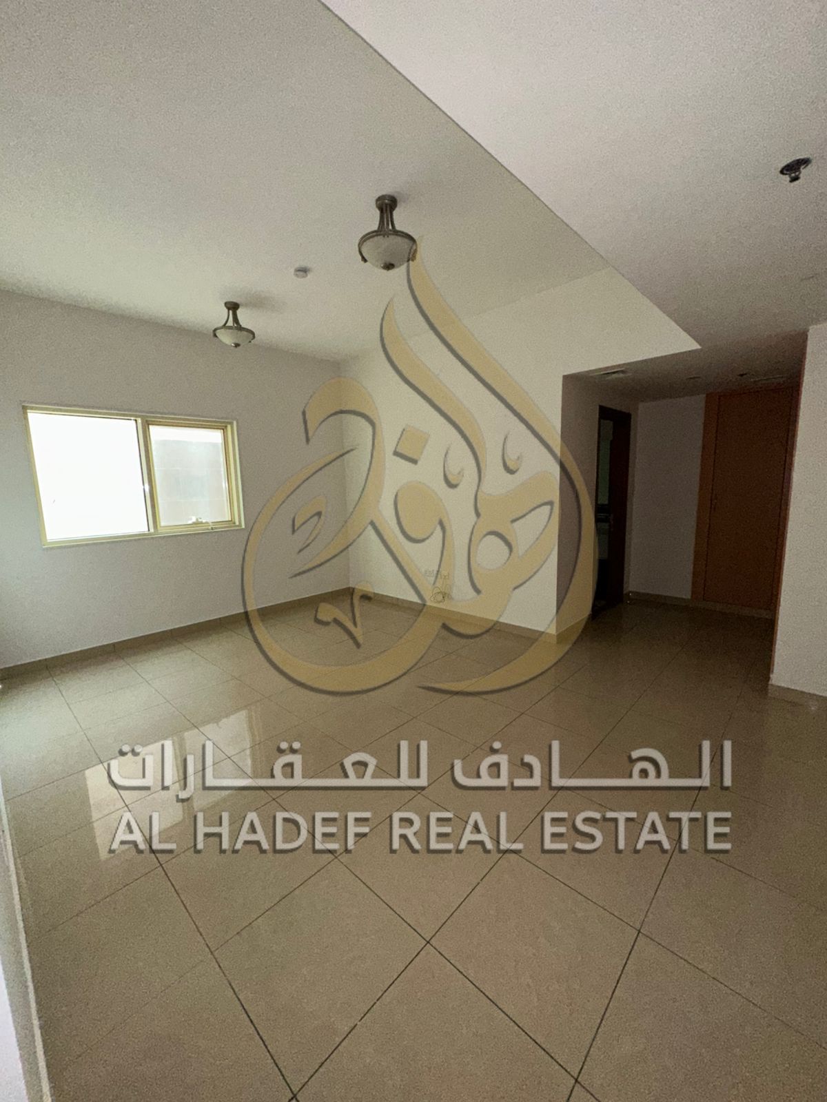 Available for rent in Al Majaz 3 - Two bedrooms and a living room - with private parking inside the tower - Free air conditioning - Gym - Free mainten