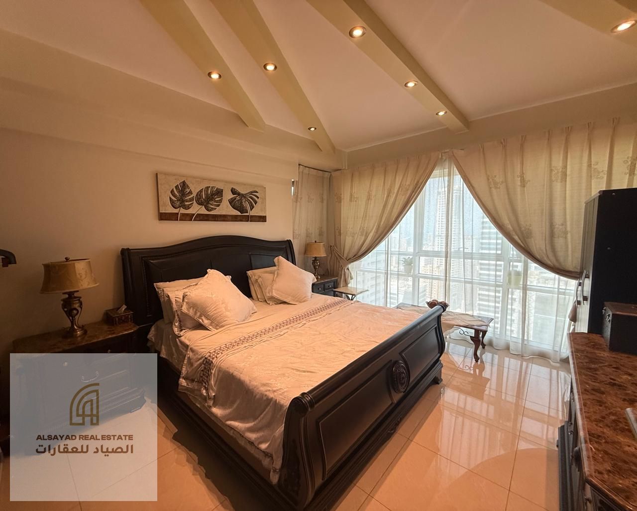 Elegant 3 BR Apartment in Al Majaz 3: Serene Living