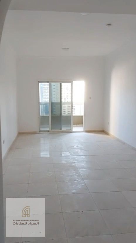 Two bedrooms and a living room with parking and a garden view, located in Al Nahdi Tower.