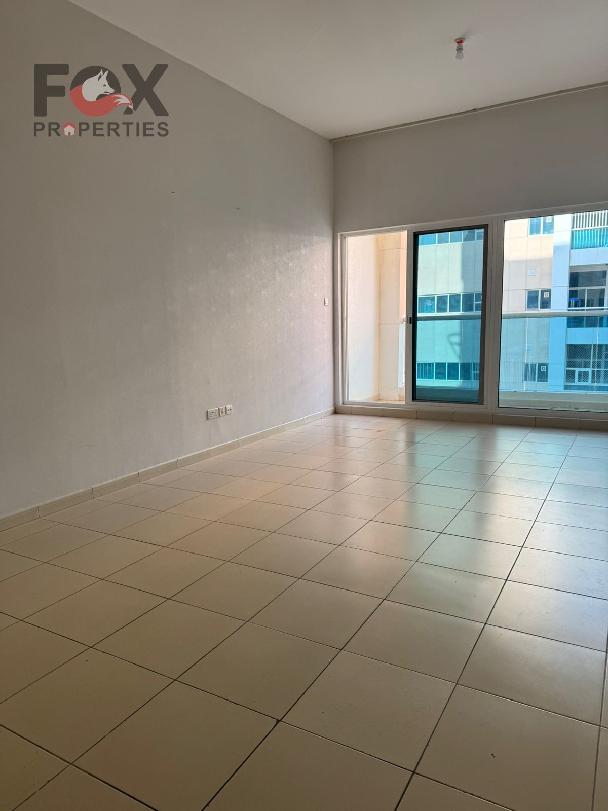 Spacious 2-bedroom apartment with a living room for sale in Ajman One Towers with monthly installments