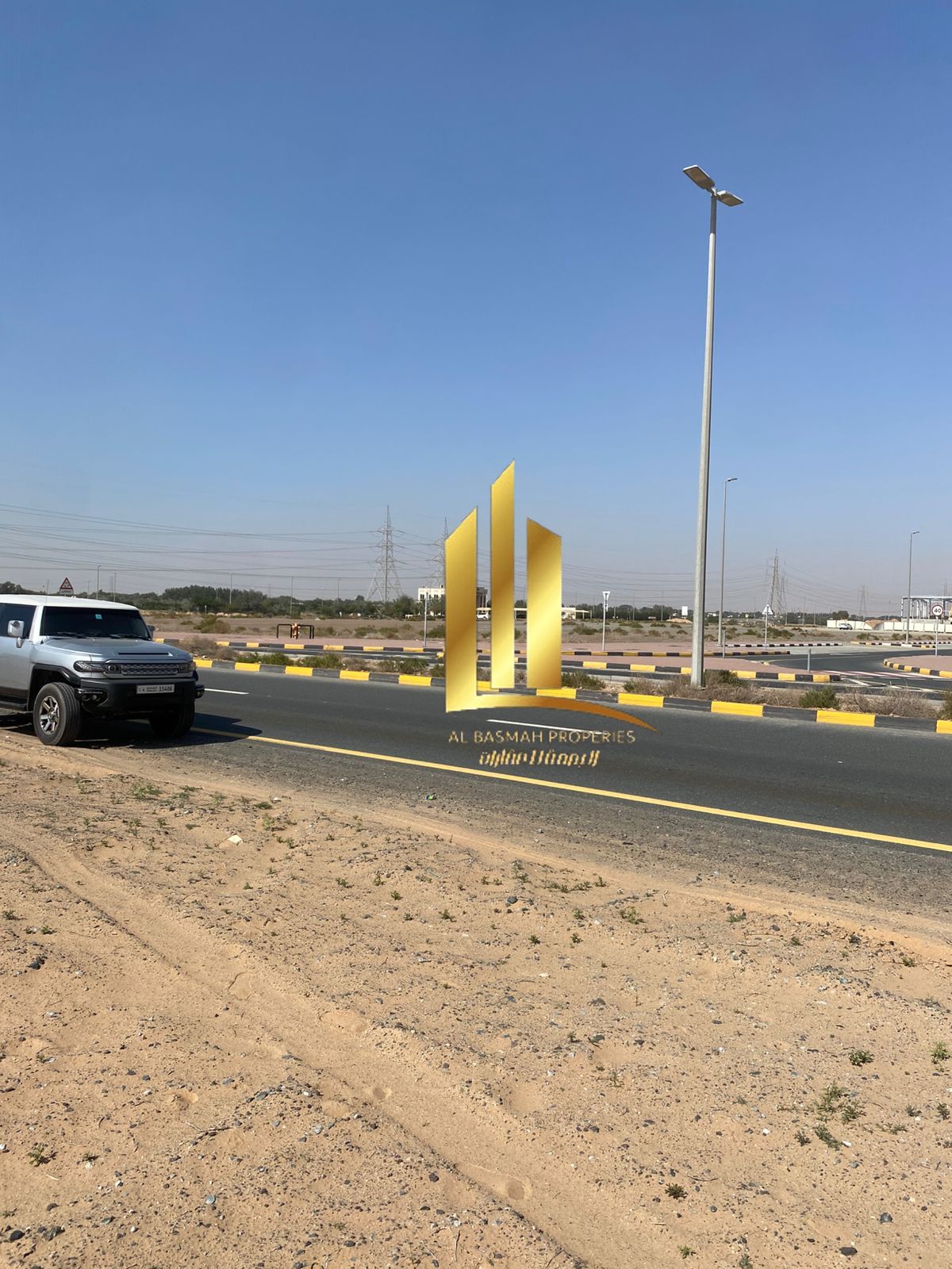 Land for sale in Al Sajaa Industrial, 22,900 sq. ft. , freehold for all nationalities, ready for construction, immediate availability.
