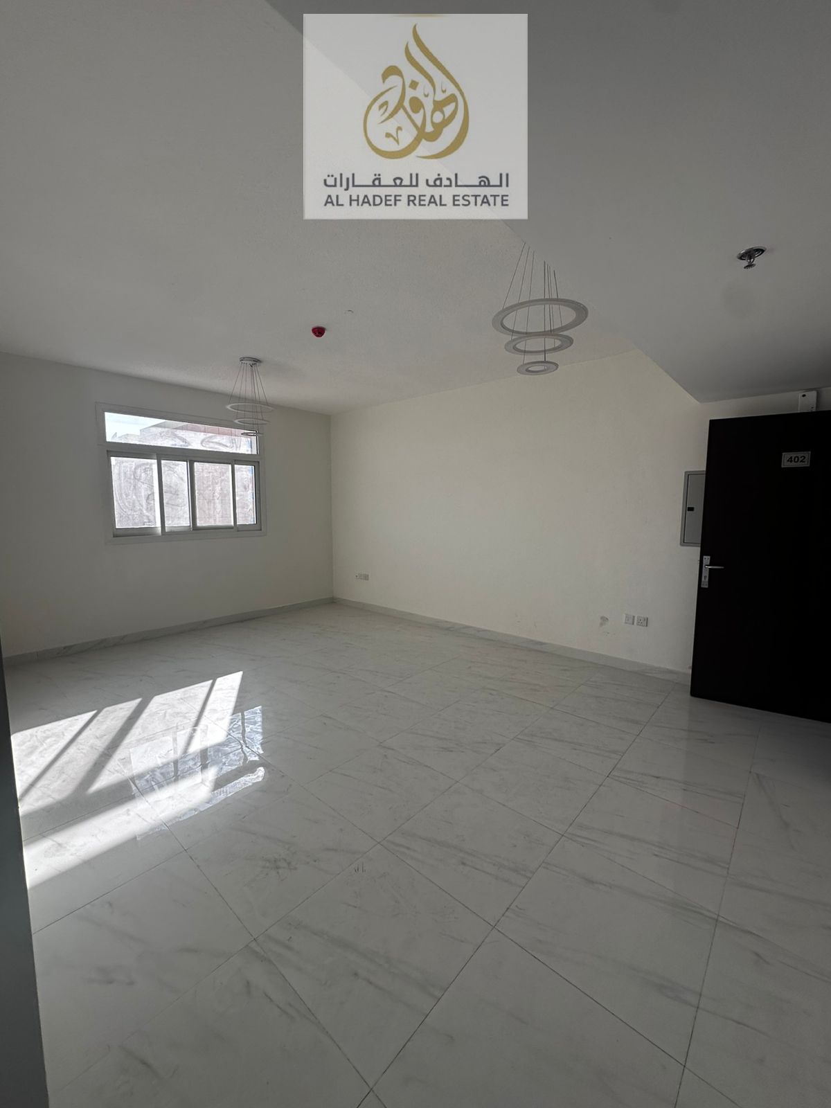A one-bedroom apartment in Ajman, Al Jurf 3, first occupancy, near the Chinese market, super deluxe finishing, large area, and payment plans available