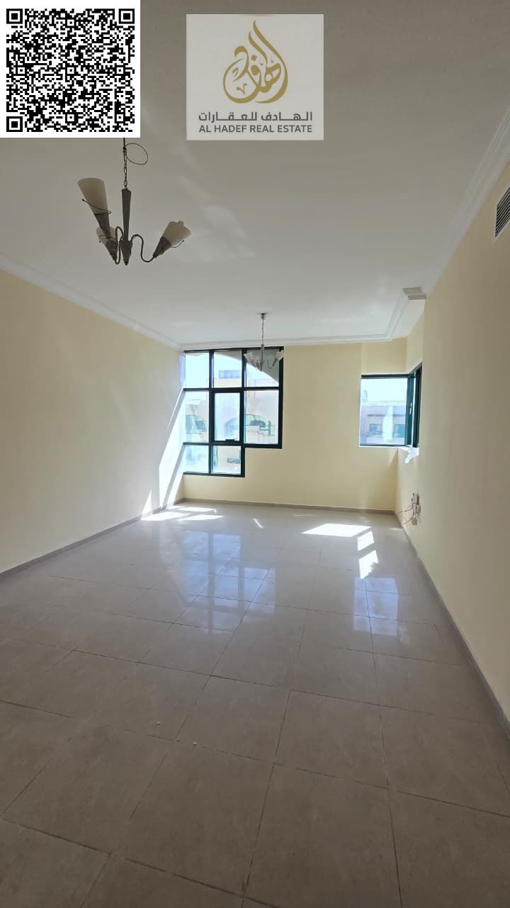 Two-bedroom apartment with a separate living room | Very spacious, two bedrooms, separate living room, two bathrooms, balcony, and hallway in Al Rashi