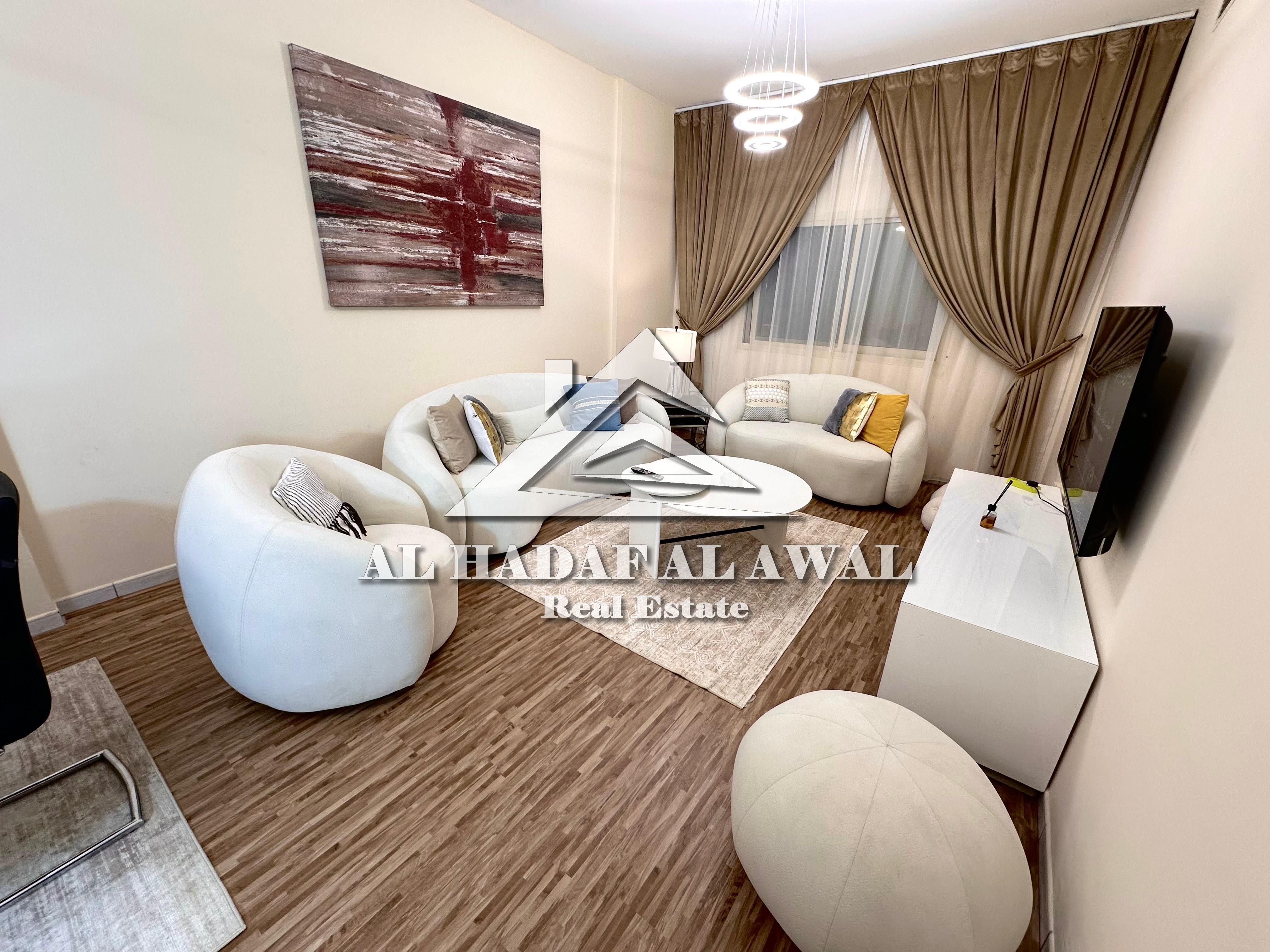 Sharjah, Al Qasba: Two bedrooms, a living room, two bathrooms, and a balcony. Good size. Rent: AED 6700 including all bills. Security deposit: AED 100