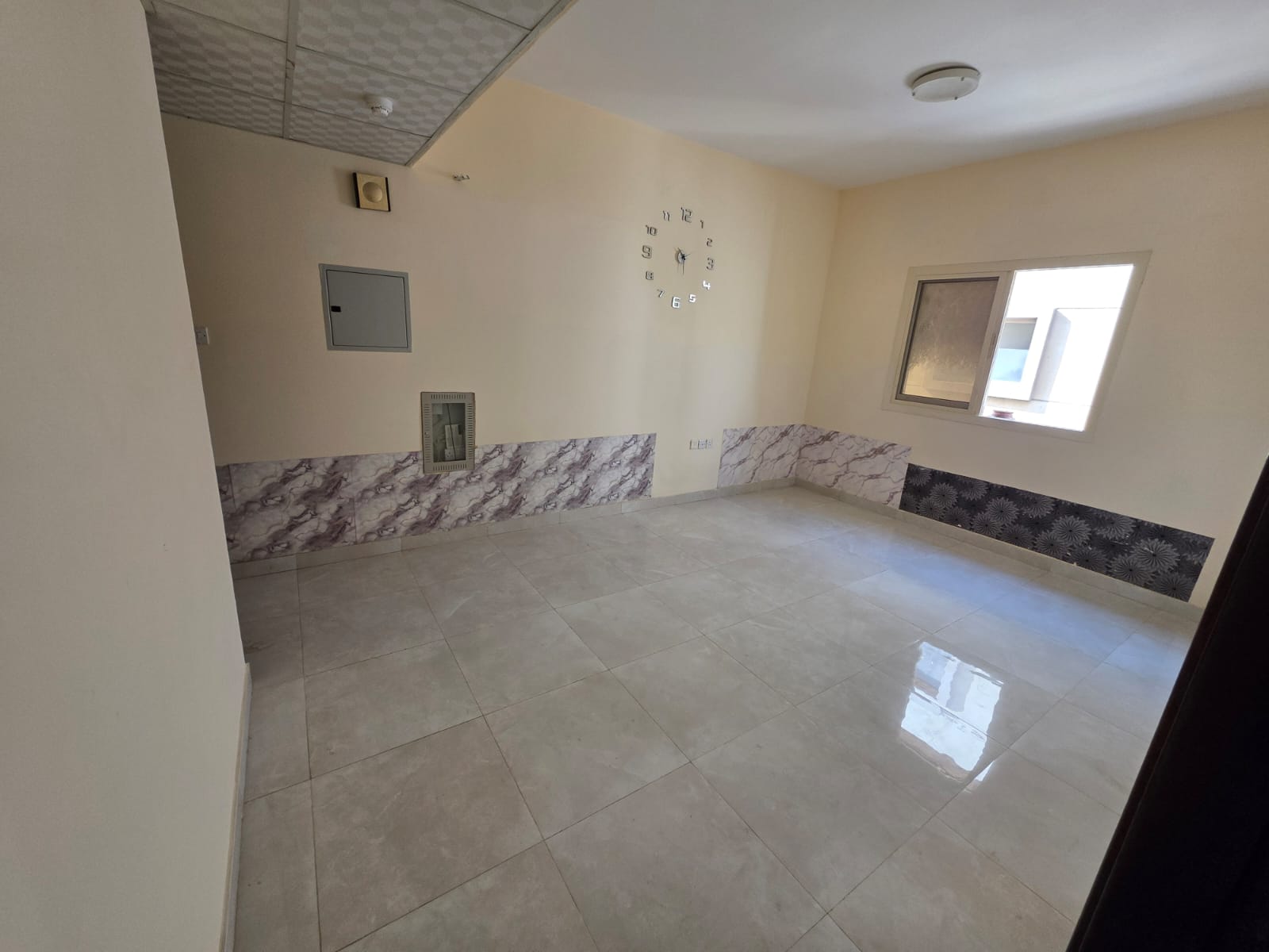 Spacious one-bedroom apartment in Al Jurf 2, Ajman, on a main road