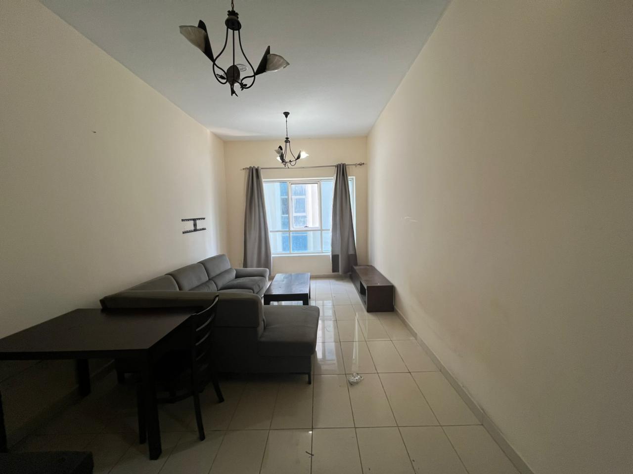 Free gym - pool, 1 month free | sea view 1BHK - living room, near Dubai exit - services, new family tower, free maintenance, central AC - gas