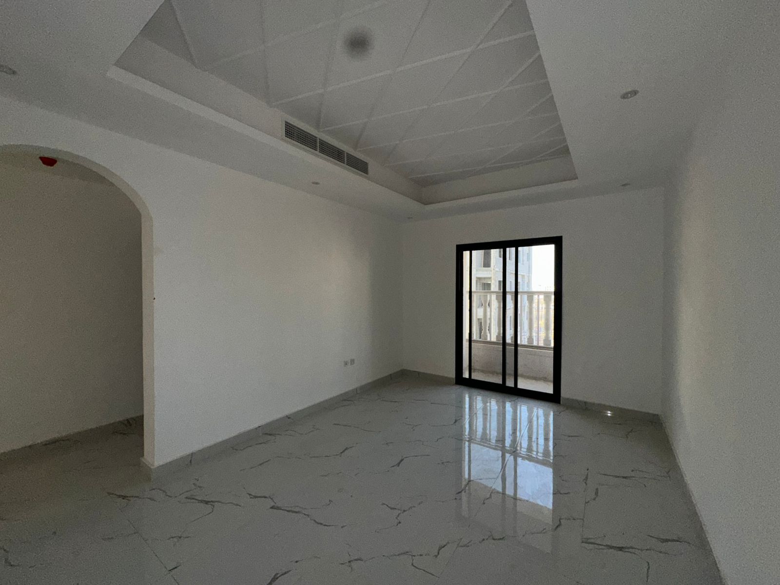 Two bedrooms, a living room, and three bathrooms. First occupancy in Al-Aliya, directly on Mohammed Bin Zayed Road.