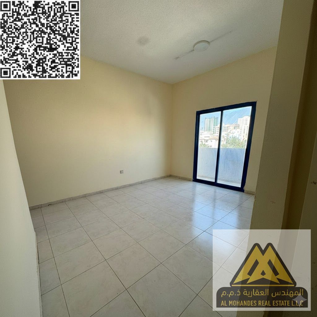 Balcony with an open view | Very spacious | Prime location close to all services | Easy access to Sharjah and Dubai