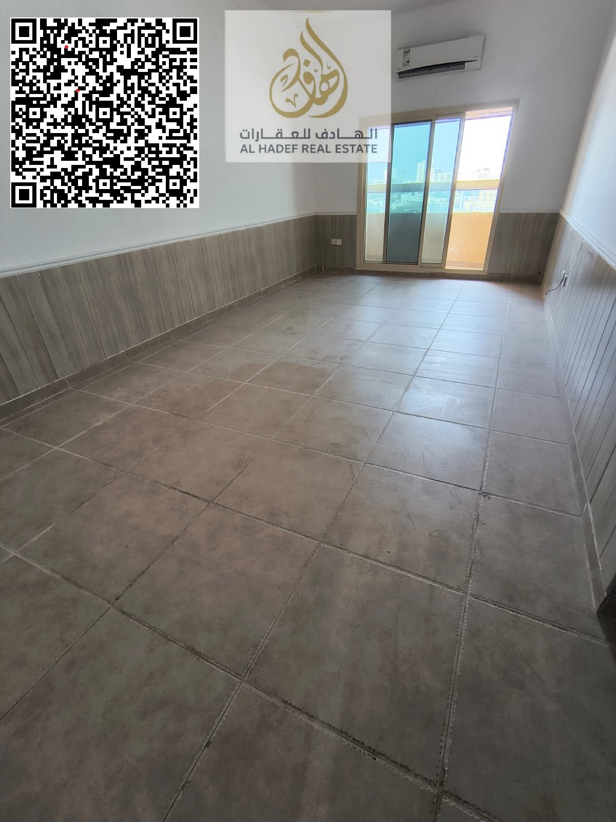 Two rooms and a living room with a balcony, three bathrooms, built-in wardrobe, Al Rawda, second block on the main street