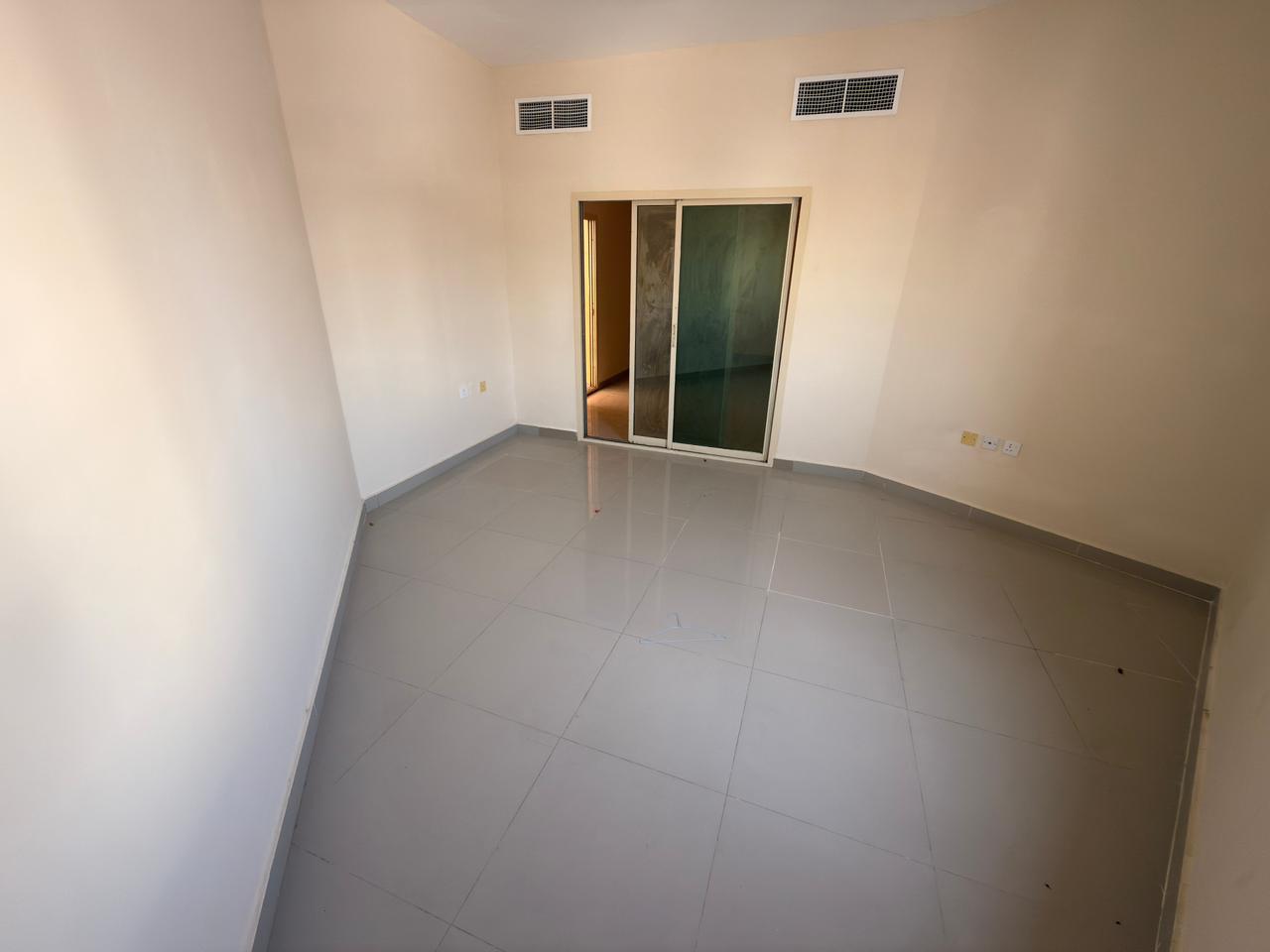 Two bedrooms and a living room for annual rent in Al Jurf 2, Ajman, near Delta Centre. On the main road opposite Al Rawda Bridge.