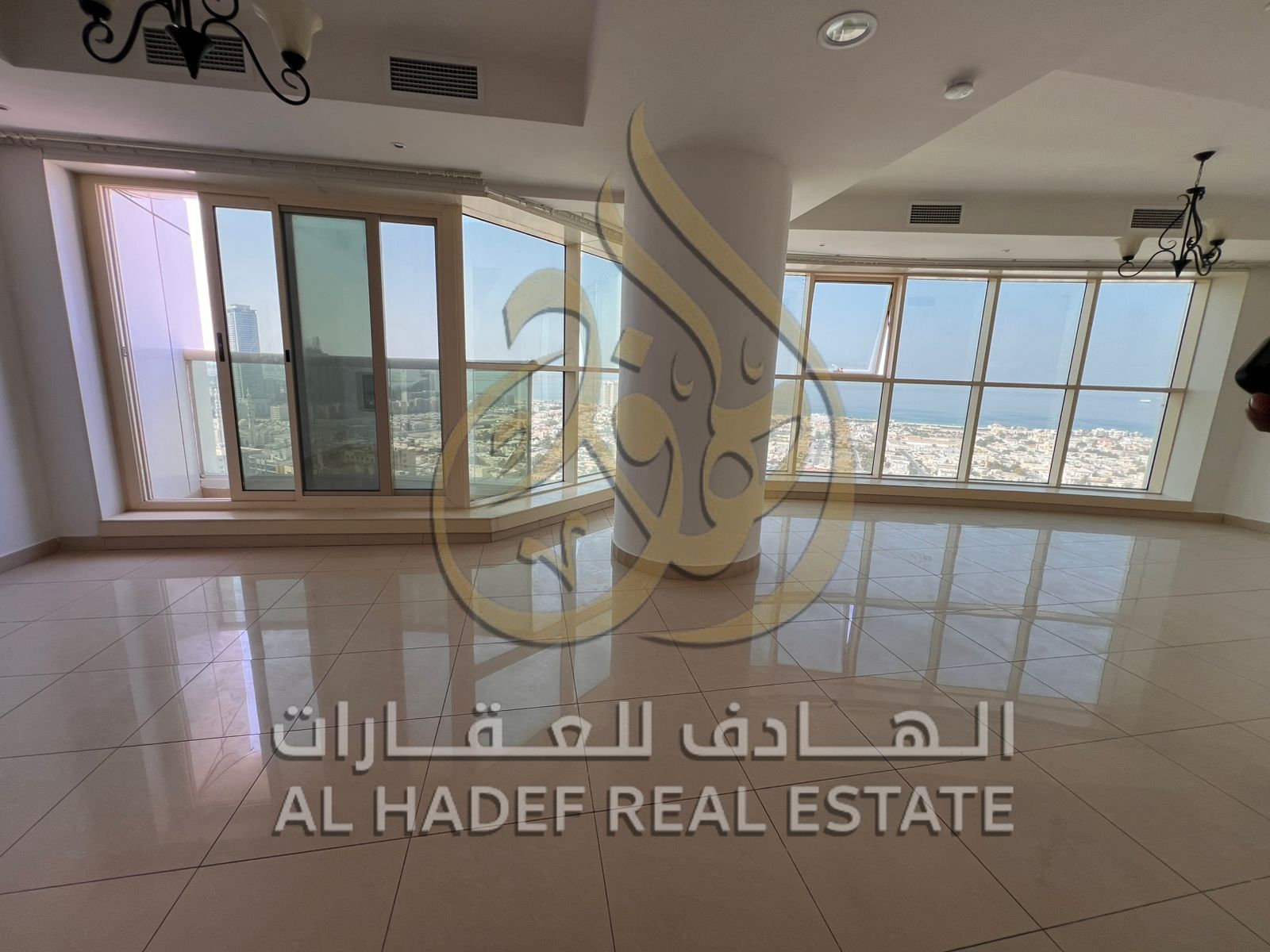 Three-bedroom apartment with living room, owner-paid air conditioning, parking, gym access, a laundry room, a balcony, and a stunning view.