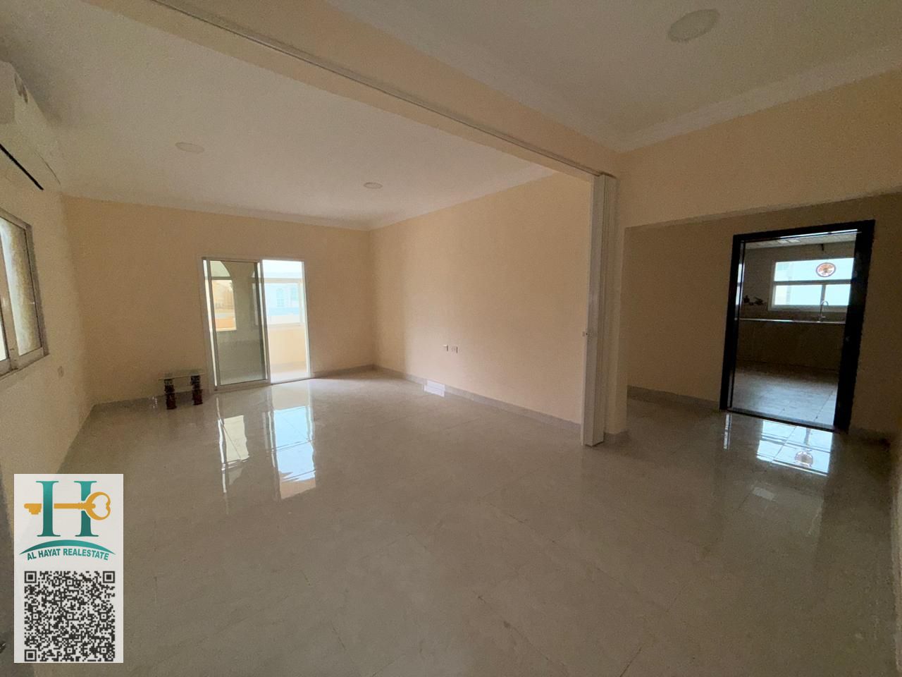For rent: 1 bedroom apartment with living room and 2 bathrooms in Al Rawda 3 – Khartoum Street. Spacious layout with a separate living room