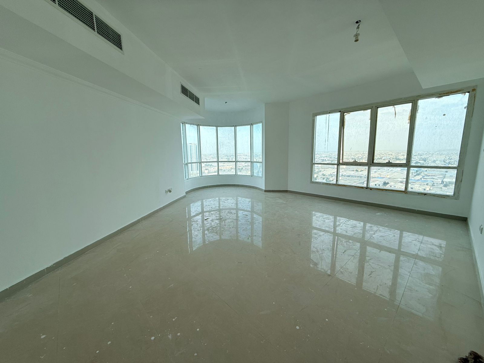 Largest and most beautiful 3-bedroom apartment in Sharjah, Al Majaz 2 Ideally located near the Dubai exit, with parking and a maid's room