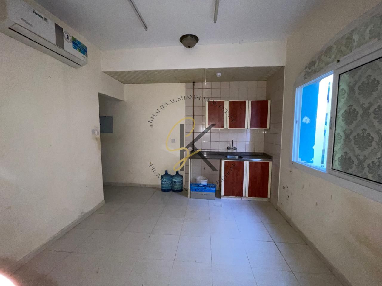 Spacious Unfurnished Studio Apartment for Rent in Muwailah, Sharjah | 450 Sqft | All Amenities | Prime Location