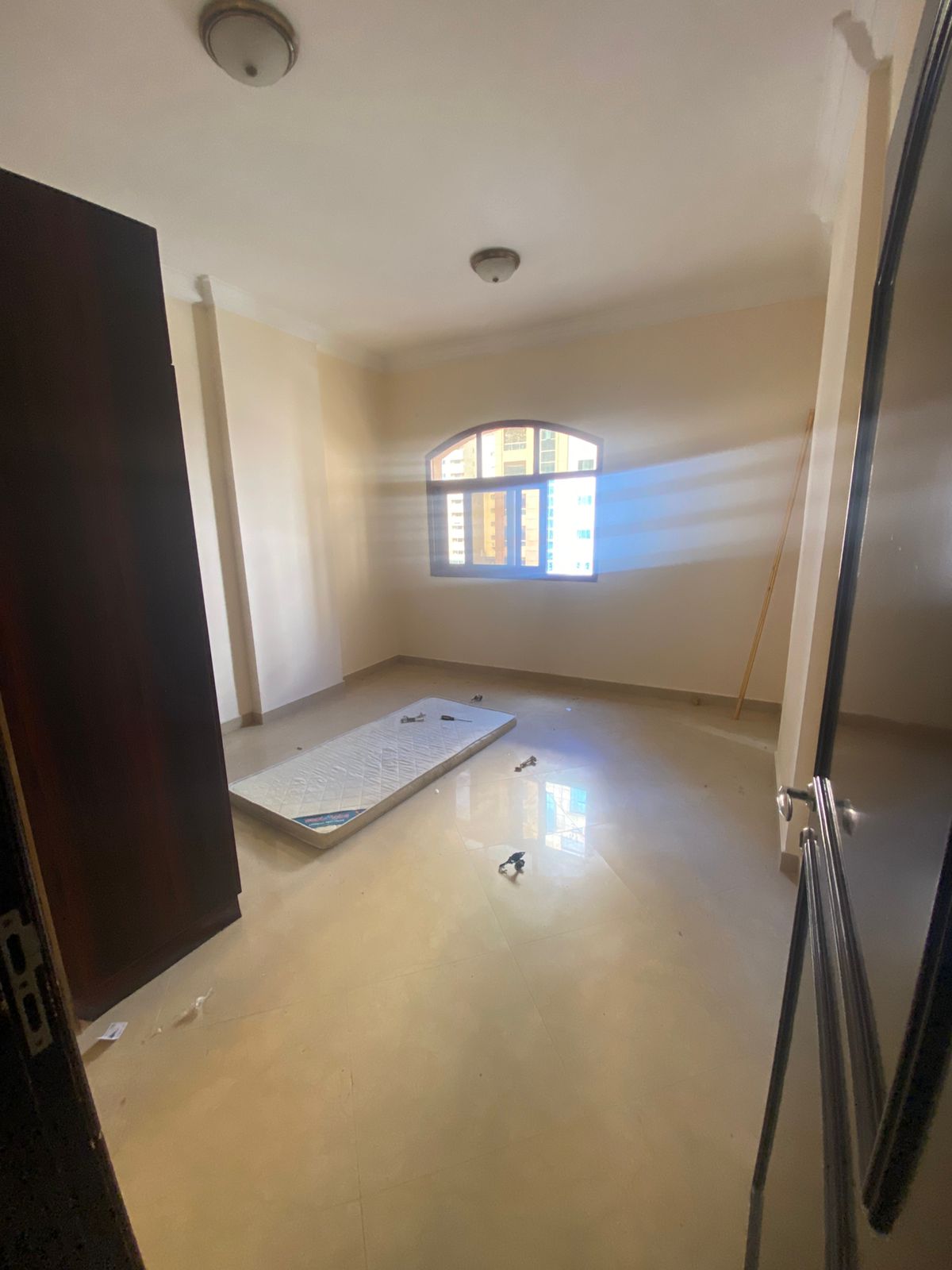 Two bedrooms and a living room in Al-Khan. Kitchen with balcony, available with unpaved parking. Excellent apartment, first occupant, close to all ser